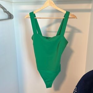 Lulu’s green bodysuit. Never worn. NWT. No flaws